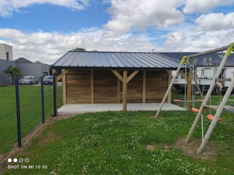 Pose d'un garage double pente à Mandeville