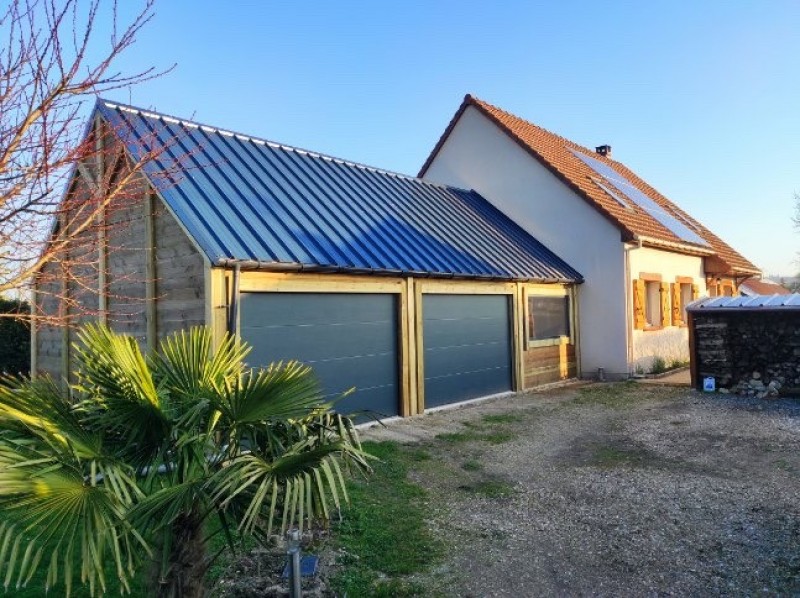 Pose d’une fenêtre sur un garage Macabois