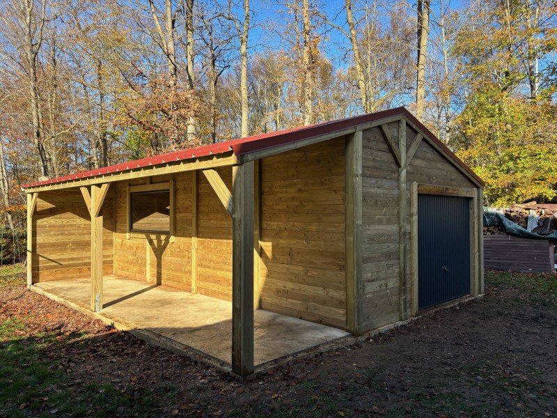 Pose d'un garage double pente avec auvent près de Conches-en-ouche
